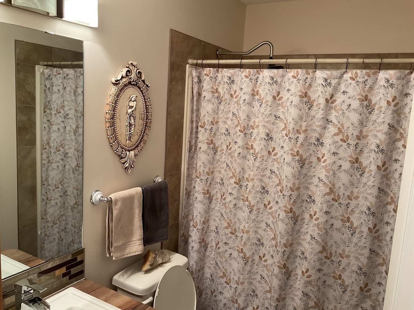 Repainted bathroom walls and trim in a Red Deer home