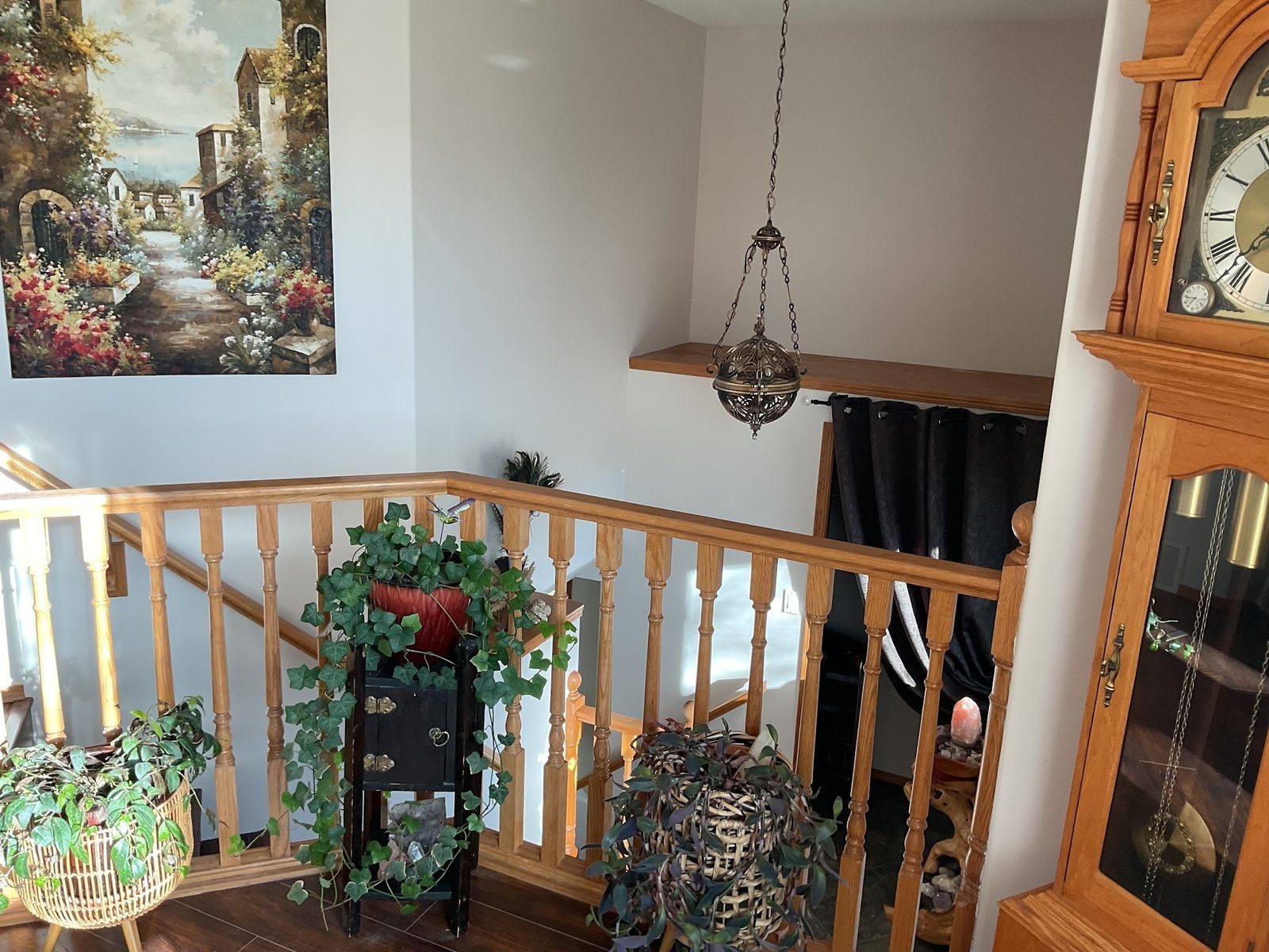 Repainted stairwell and landing walls in a Red Deer house